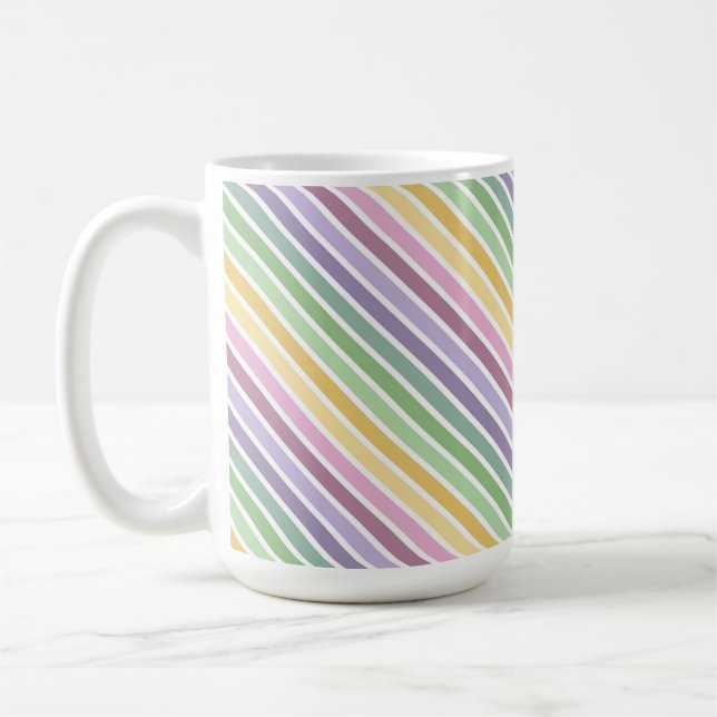 LILA ROSA GRÖN GUL PÅSKRANDIG KAFFEMUGG (Vänster)