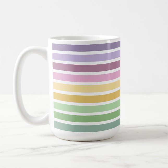 LILA ROSA GRÖN GUL PÅSKRANDIG KAFFEMUGG (Vänster)