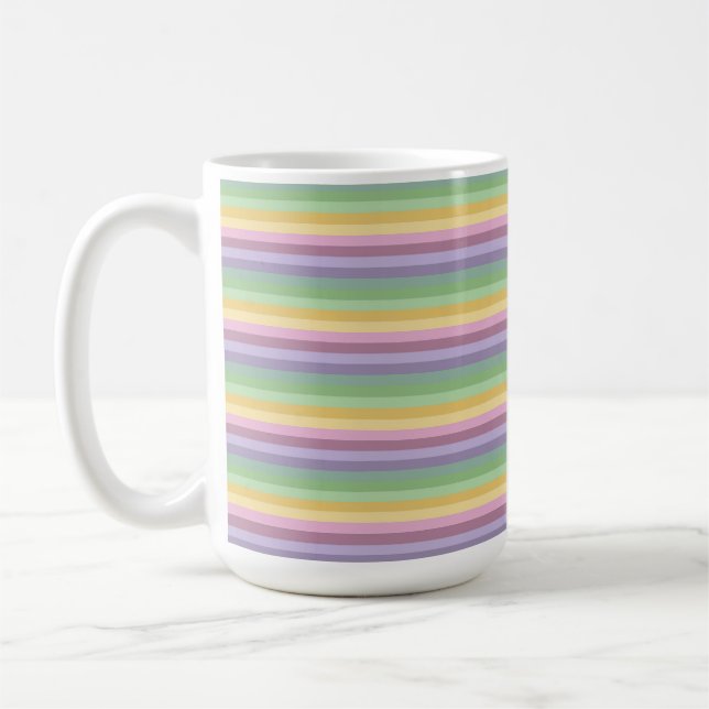 LILA ROSA GRÖN GUL PÅSKRANDIG KAFFEMUGG (Vänster)
