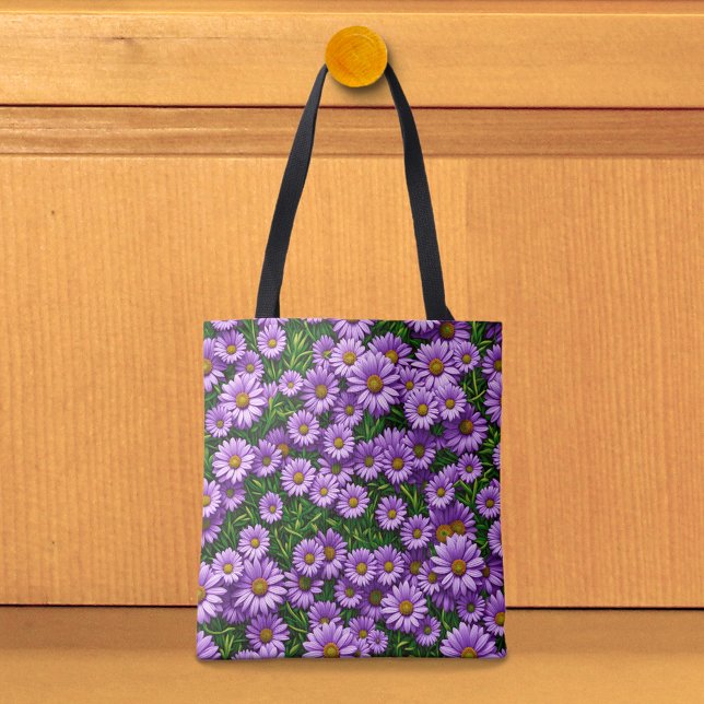 Lila tusenskönor handväskor tygkasse (Tote bag with purple daisies.)