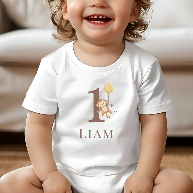 Lilla apfödelsedagsnummer t shirt (Toddler wearing a white T-Shirt with the number 1 and a monkey holding a balloon.)