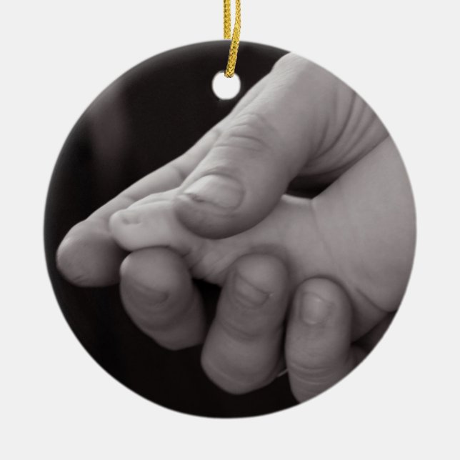 Lilla fot i stor hand Ornament (Framsidan)