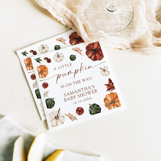 Lilla knapp på hur barnskussen sjunker pappersservett (Skapare uppladdad)