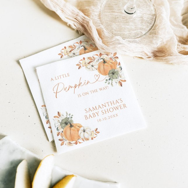 Lilla knapp på hur barnskussen sjunker pappersservett (Skapare uppladdad)