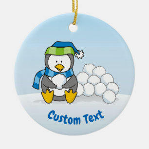 Lilla penguin sitta med snöbullar julgransprydnad keramik