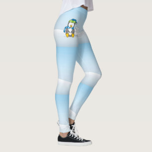 Lilla penguin sitta med snöbullar leggings