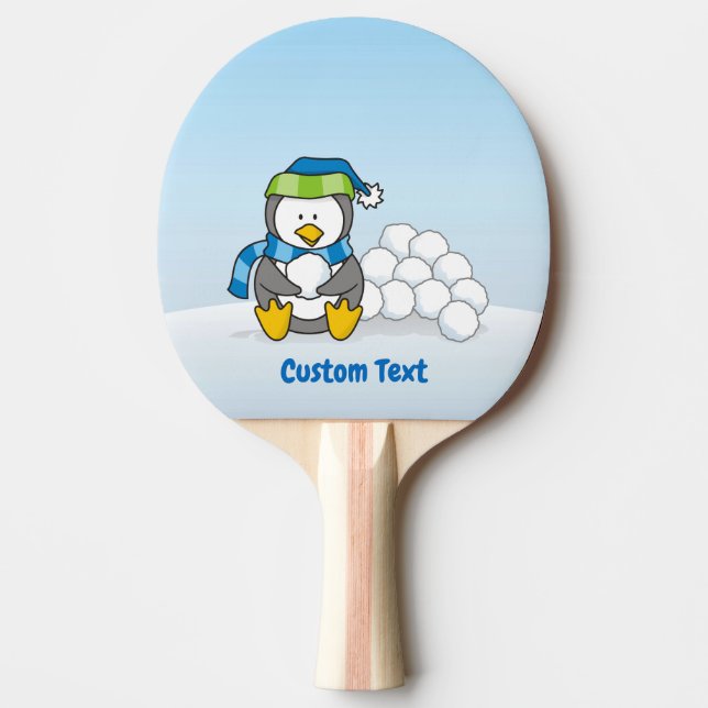 Lilla penguin sitta med snowbullping pong pa pingisracket (Framsidan)