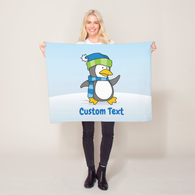 Lilla penguin som går på snö loppfilt fleecefilt (På plats)