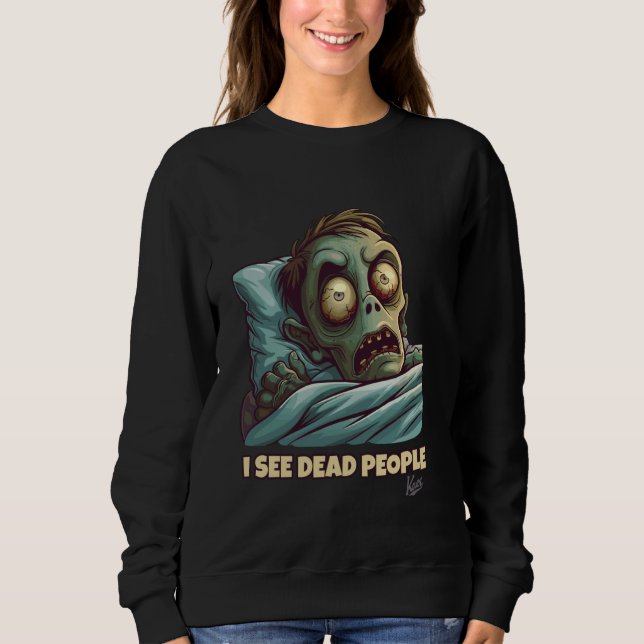 Lilla skrämt zombie i sängen kan se döda människor t shirt (Framsida)