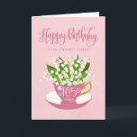 Lily of the Valley Tekopp 105 Birthday Friend Kort<br><div class="desc">En liten rosa te kopp fylld med ett vackert gäng liljor från dalen,  tillsammans med handskriften ord Grattis på födelsedagen på kortets överkant och handskriften ord 105 i dag med kärlek hjärtan på te kopp. Ett sött födelsedagskort för din vän som fyller 105 i dag.</div>