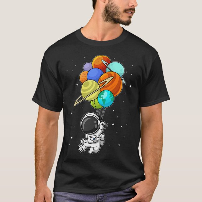 Linnande Astronaut Holding Planet Balloons Space K T Shirt (Framsida)