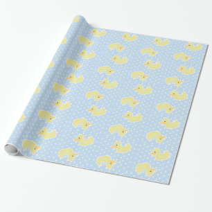 Lite gul anka som slår in papper (tända - blått presentpapper