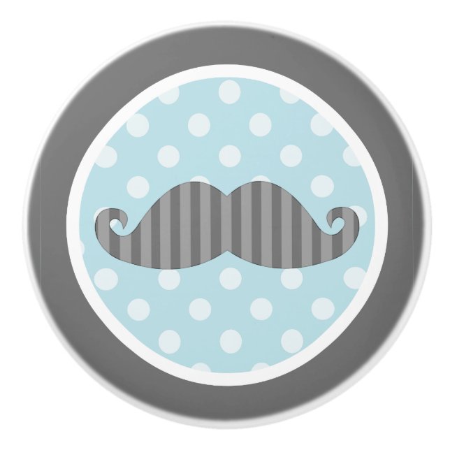 Lite manmustaschblått och grå färg knopp (Framsidan)