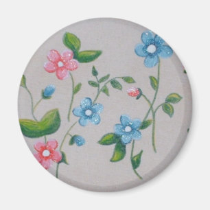 Lite rosa blåa blommor magnet