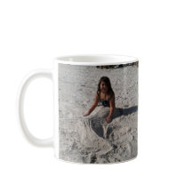 lite sjöjungfru på strand vid bbillips