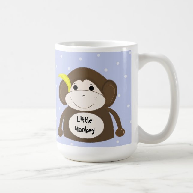 Liten apa med en gul banan kaffemugg (Höger)