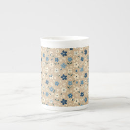 Liten blå och vit blommig mönster benporslin mugg
