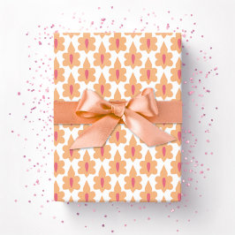 Liten blad i rosa och orange presentpapper