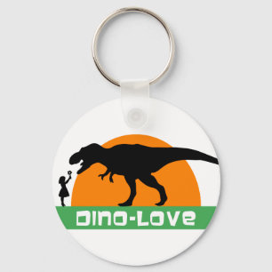 Liten flicka och dinosaur nyckelring