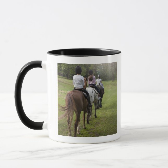 Liten flicka som rider hästar mugg (Vänster)