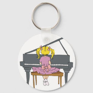liten flicka som spelar piano nyckelring