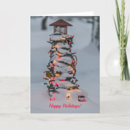 Liten fyr dekorerad för jul kort