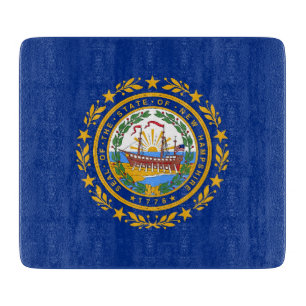 Liten glasruta med New Hampshire flagga