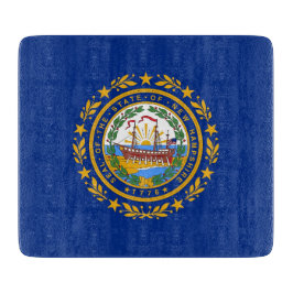 Liten glasskärbräda med New Hampshires flagga