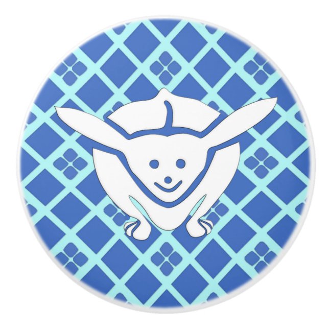 Liten japansk kanin, blå bakgrund knopp (Framsidan)