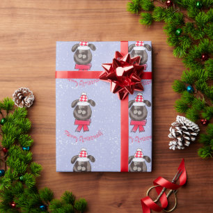 Liten julhund som bär stickad mössa och halsduk presentpapper