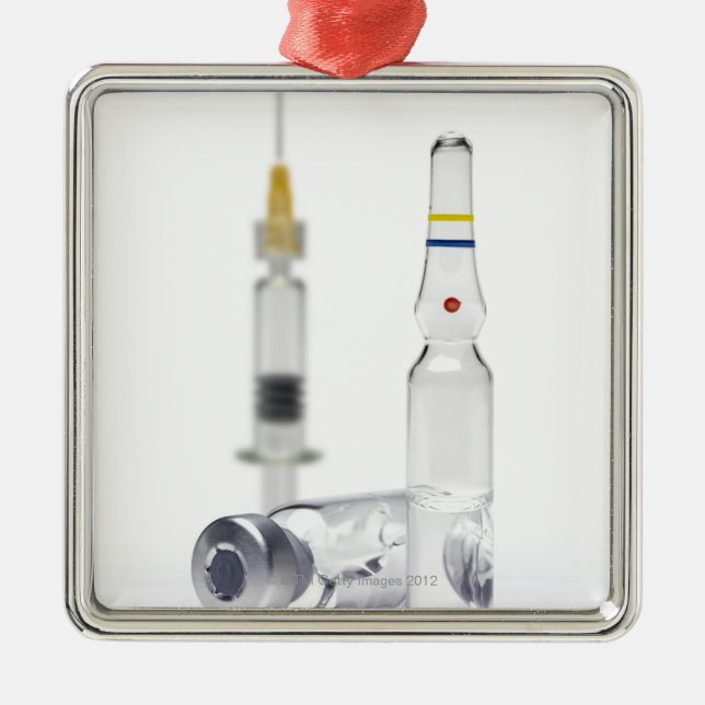 Liten medicinflaska som innehåller medicinen för julgransprydnad metall (Framsidan)