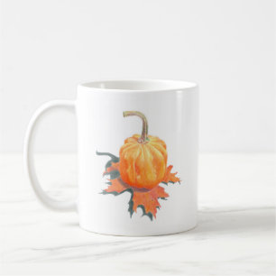 Liten pumpa på ekblad kaffemugg