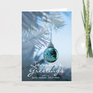 Liten reflekterande blåttbauble på vitjul helgkort