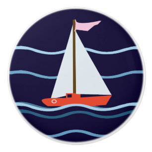 Liten röd segelbåt knopp