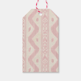 Liten rosa ikat i småskalig design på krämvit bakg presentetikett