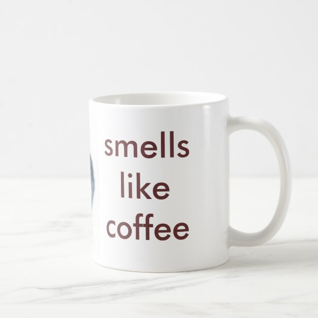 liten sqirrel, lukter gillar kaffe kaffemugg (Höger)