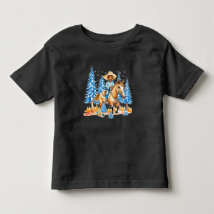 Liten svart cowboy på häst vinterscen t shirt