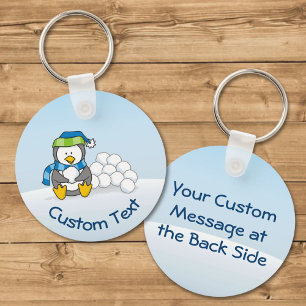 Little Penguin Sitta med Snöbollar Keychain Nyckelring