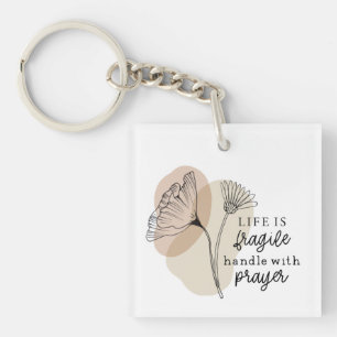 Livet är en bräcklig hand med böneblommor