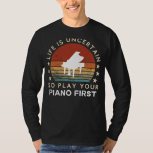 Livet är osäkert, spela piano först, rolig tee