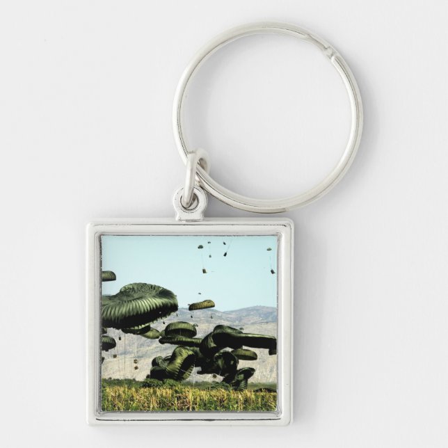 Livsmedelsbuntar och vatten levereras till luft fyrkantig silverfärgad nyckelring (Framsidan)