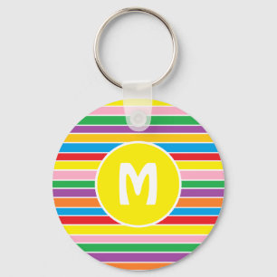 Ljus färgrik regnbågsrandig monogram nyckelring