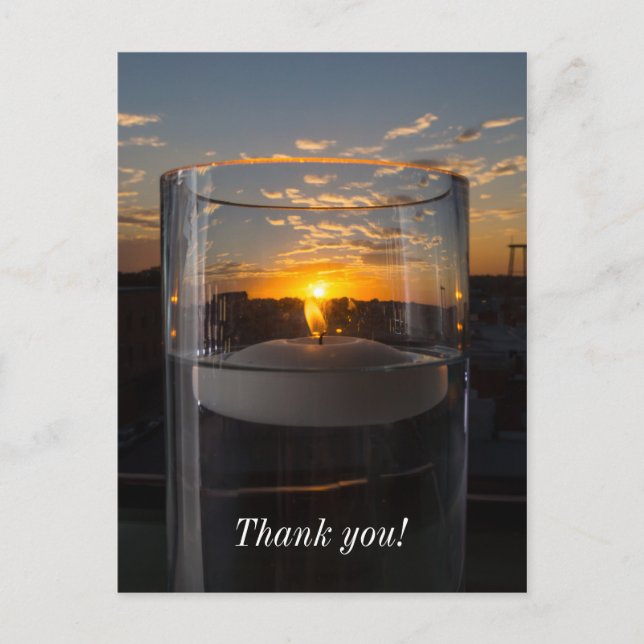 Ljus från levande ljus i solnedgången vykort (Framsida)