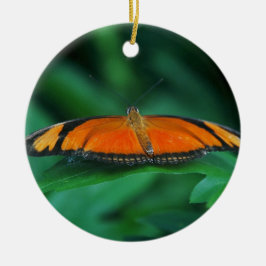 Ljus orange och svart fjäril på blad julgransprydnad keramik