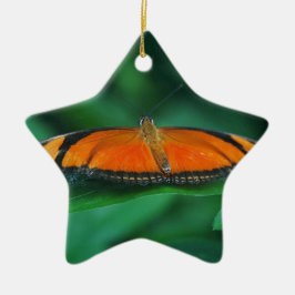 Ljus orange och svart fjäril på blad julgransprydnad keramik
