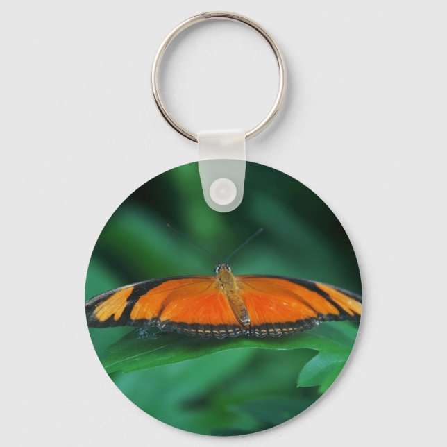 Ljus orange och svart fjäril på blad nyckelring (Framsida)