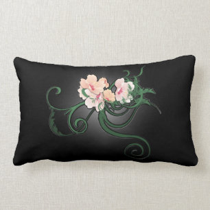 Ljus rosa blombild på svart lumbarkudde