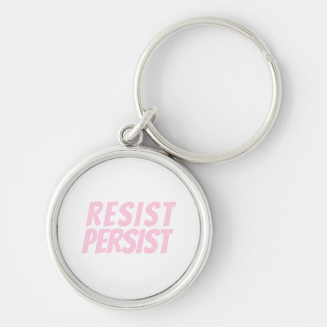 ljus rosa vit "resist Persist" Rund Silverfärgad Nyckelring (Framsidan)