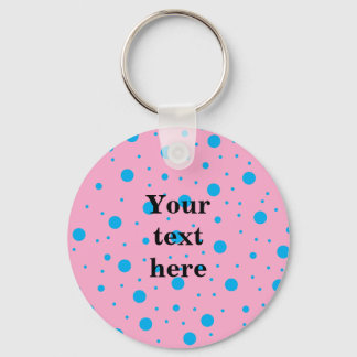 Ljusa rosa himlar blå liten och stor polka dots nyckelring