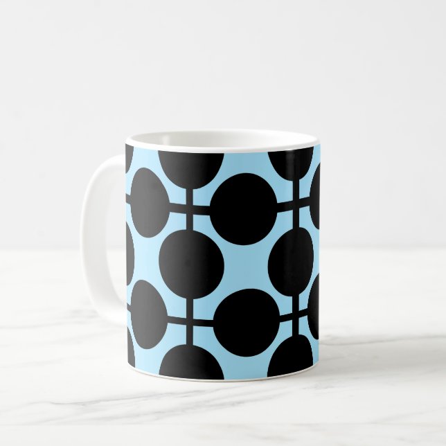 Ljusblå med svart geometrisk  kaffemugg (Framsida vänster)